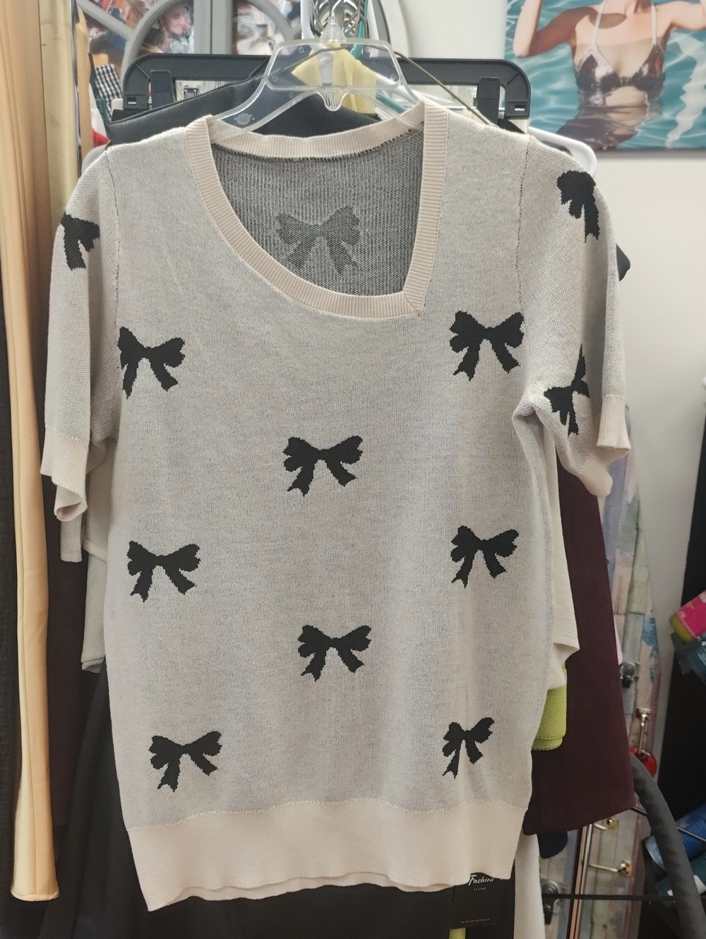 Beige Short-Sleeve Sweater with Black Bow Motif